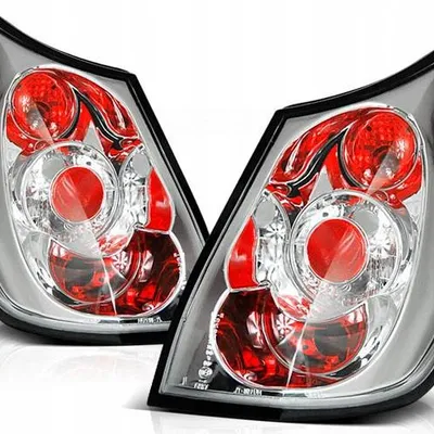 Lampy tylne nowe RENAULT SCENIC 03-06 CHROME