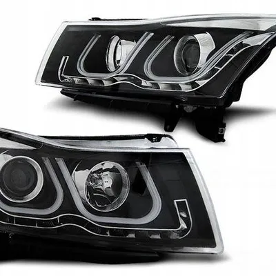 Lampy przednie reflektory CHEVROLET CRUZE 0D 2009
