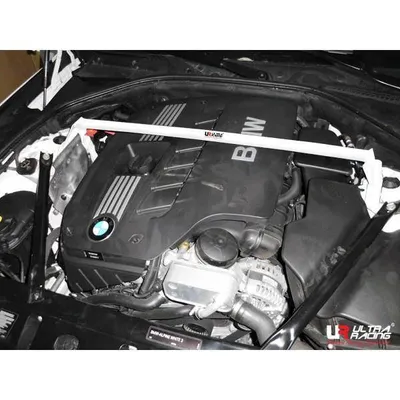 Rozpórka BMW 520/525/528 F10 10+ UltraRacing 2P przednia górna Strutbar