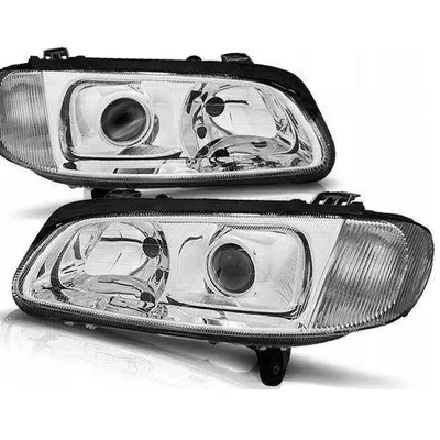 Lampy przednie reflektory Opel Omega B CHROM socze